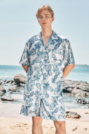 Front view of the Ocean Blue Men's Short Pajama Set, showcasing the hand-painted ocean floral patterns on the cloud blue fabric.