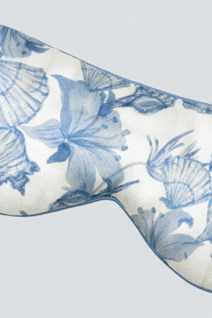Close-up of MANITO Ocean Blue Men's Silk Eye Mask, featuring an elegant blue floral print on luxurious mulberry silk.