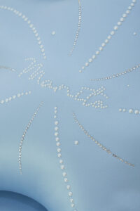 MANITO close-up of Ocean Starfish Throw Pillow with pearl and rhinestone embellishment.