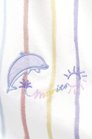 Close-up of dolphin embroidery on MANITO girls' midi dress, featuring ocean-inspired details.