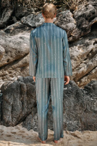 Back view of MANITO Ocean Stripe Men's Pajama Set showing full-length sleeves and pants with continuous white stripe pattern.