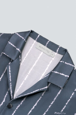 Close-up of MANITO Ocean Stripe Men's Pajama Set collar with contrast inner lining and branded label for detailed craftsmanship.