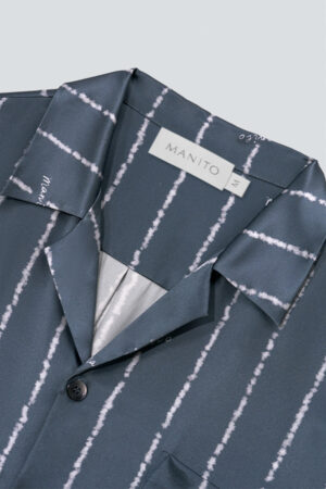 Close-up of the collar tag on the MANITO Ocean Stripe Men's Short Pajama Set shirt.