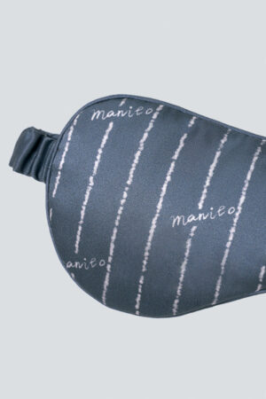 Alternate angle showing fine stripe print and texture on MANITO Ocean Stripe Men's Silk Eye Mask.