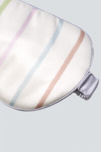 A close-up of the soft, contoured edges of MANITO silk eye mask designed to block out light.