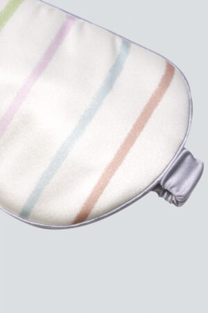 A close-up of the soft, contoured edges of MANITO silk eye mask designed to block out light.