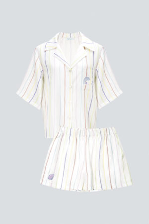 Flat lay of MANITO rainbow striped shirt and matching shorts, a comfortable and stylish pajama set.