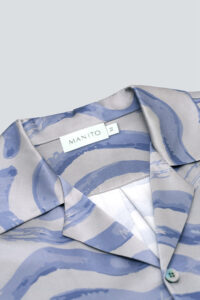 Close-up of MANITO label on Ocean Wave Men's Short Pajama Set collar.