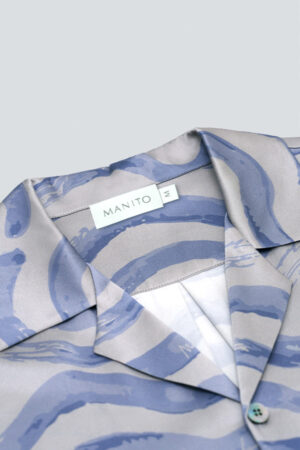 Close-up of MANITO label on Ocean Wave Men's Short Pajama Set collar.