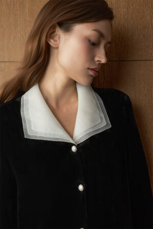 Side view of woman in Poetic Tulle Collar Velvet Pajama Set, focusing on the delicate tulle collar and plush velvet texture.