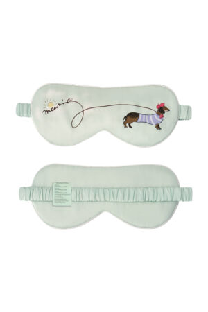 Puppy Silk Eyemask in green with a dachshund and a playful leash forming the MANITO logo, shown from both sides.