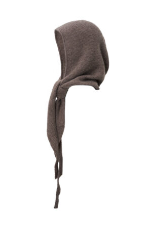 Purity Knit Balaclava in brown, angled view highlighting the sculpted hood and gently draped ties.
