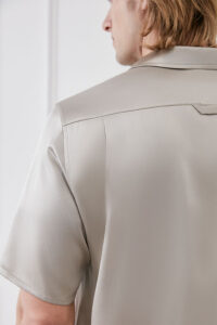 Close-up of Remington pajama shirt shoulder seam and collar stitching.