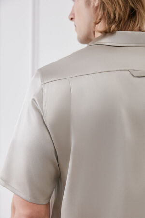 Close-up of Remington pajama shirt shoulder seam and collar stitching.