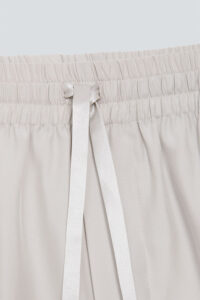 Close-up of the Remington shorts' adjustable drawstring and elastic waist, emphasizing comfort and fit.