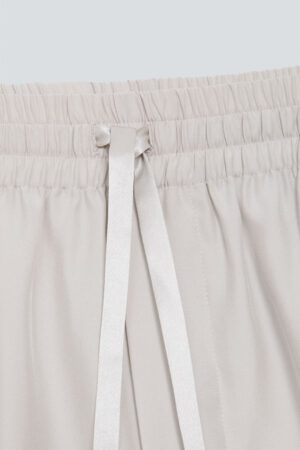 Close-up of the Remington shorts' adjustable drawstring and elastic waist, emphasizing comfort and fit.