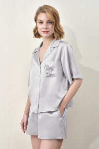 MANITO Remington Women's Silk Short Pajama Set in grey shown on model with hands in pockets.