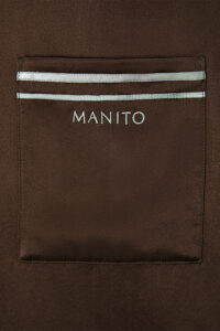 Chest pocket of MANITO Ribbon pajama shirt in brown with embroidered logo and stripe accents.