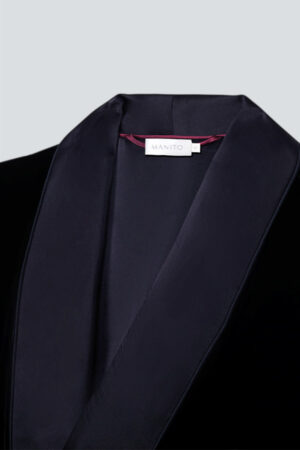 Close-up of MANITO velvet robe for men collar, showing satin lapel and inner label design.