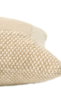 Corner detail of Sand Dune Knit Pillow, showing its dense weave and soft wool-silk finish.