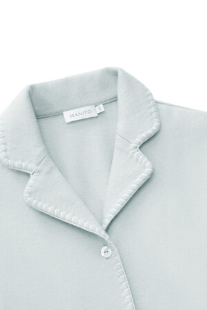 Close-up of Shell Baby's Silk Wool Pajama Set showing lapel collar, fine stitching, and soft silk wool fabric.