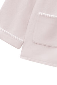 Detail of Shell Baby's Silk Wool Pajama Set with delicate embroidered trim on cuffs and pocket edges.