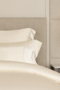 Close-up of MANITO Silver Wire Silk Duvet Cover with coordinating silk pillowcases.