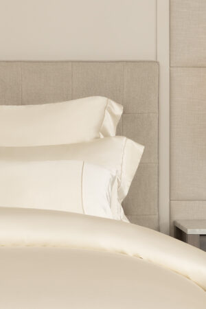 Close-up of MANITO Silver Wire Silk Duvet Cover with coordinating silk pillowcases.