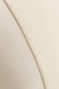 Detailed view of the gold-edged trim on MANITO Silver Wire Silk Duvet Cover.