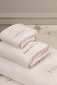 MANITO Soft Feeling 3 Pieces Bath Towel Set in beige trim, embroidered logo design made with mulberry silk and Xinjiang Sea Island cotton.