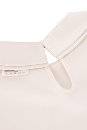 Back collar design of MANITO Sophia Baby Romper with keyhole button closure.