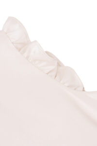 Ruffle sleeve detail on MANITO Sophia Baby Sleeveless Romper made of mulberry silk.