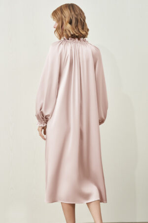 MANITO Sophia silk nightdress in an ballet pink color from a back angle.