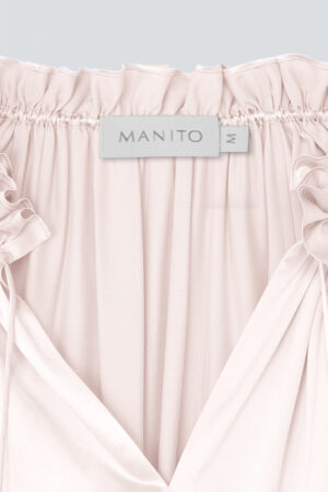 The neckline detail of MANITO Sophia silk nightdress in an ballet pink color.