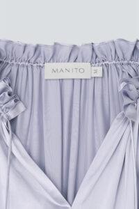 Neckline detail of MANITO Sophia silk nightdress in an orchid petal color.