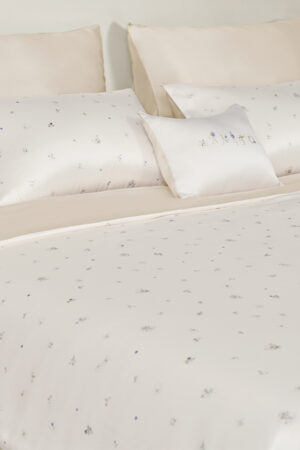 Sweet Garden Bedding Sets with Fitted Sheet-4 Pieces showing reversible almond-beige and champagne-grey silk bedding.