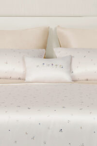 Sweet Garden Bedding Sets with Fitted Sheet-4 Pieces styled with coordinated silk pillowcases and floral embroidery accents.