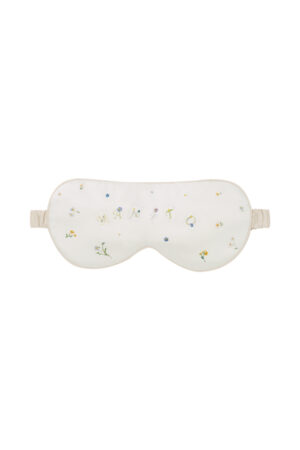 Sweet Garden Silk Eye Mask featuring floral embroidery and almond beige piping for a soft, elegant look.