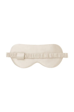 Back view of the Sweet Garden Silk Eye Mask showing the smooth almond beige silk and elastic band.