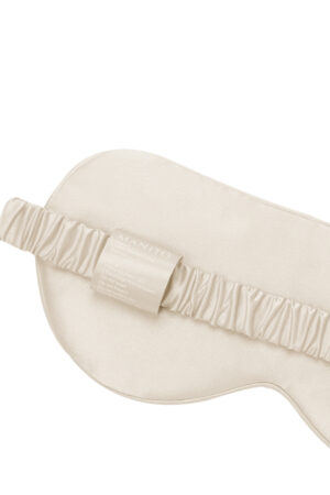 Sweet Garden Silk Eye Mask elastic band and care label made from smooth mulberry silk.