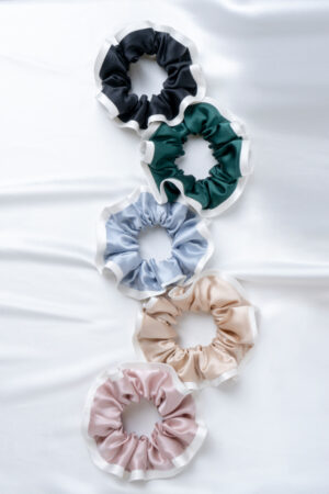 Five-color lineup of the Two-tone Silk Scrunchies with peony-white trim, offering elegant options to match any outfit.