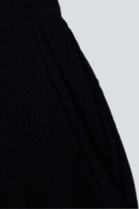 Close-up of the soft knit fabric texture on the MANITO Teddy classy elastic knit lounge set in black.