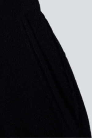 Close-up of the soft knit fabric texture on the MANITO Teddy classy elastic knit lounge set in black.