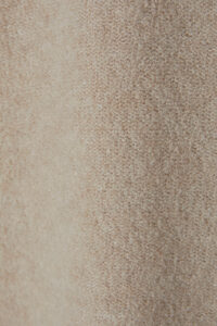 Fabric texture close-up of Teddy Women's Cotton Wool Knit Lounge Set in beige, highlighting the plush softness.