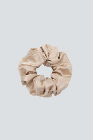 Champagne Thick Silk Scrunchie offers a quiet neutral that pairs effortlessly.