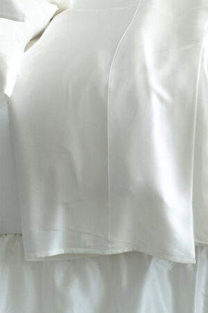 Luxurious 22 silk duvet cover, with a focus on the delicate texture and quality, offering a tranquil sleep experience.