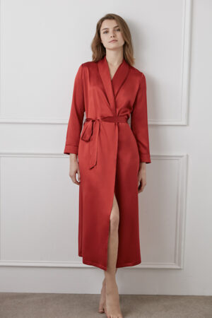 Sophisticated red wedding robe with a high slit, styled minimally for an elegant look, from MANITO's wedding robe gift box.