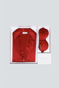 MANITO wedding pajamas gift box displayed elegantly, containing a red silk pajama set with an eye mask.
