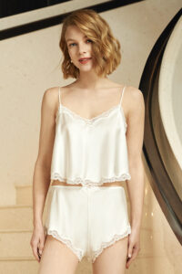 MANITO Wedding Women's Lace Silk Pajama Set front view showing full outfit with flowing top and curved lace-trimmed shorts.