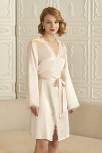 Front full view of MANITO Wedding Women's Lace Silk Short Robe, worn by model, with defined waistline and lace trimming all around.